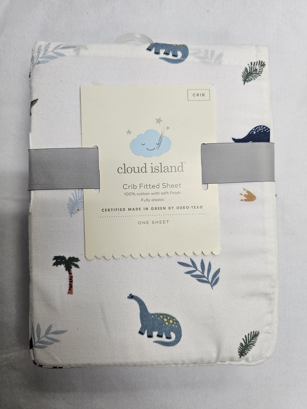 Cloud Island White Crib Sheet with Blue & Green Dinosaur Print